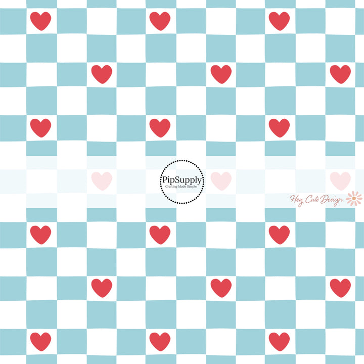 This holiday fabric by the yard features blue and white checker pattern with red hearts. This festive pattern fabric can be used for all your sewing and crafting needs!