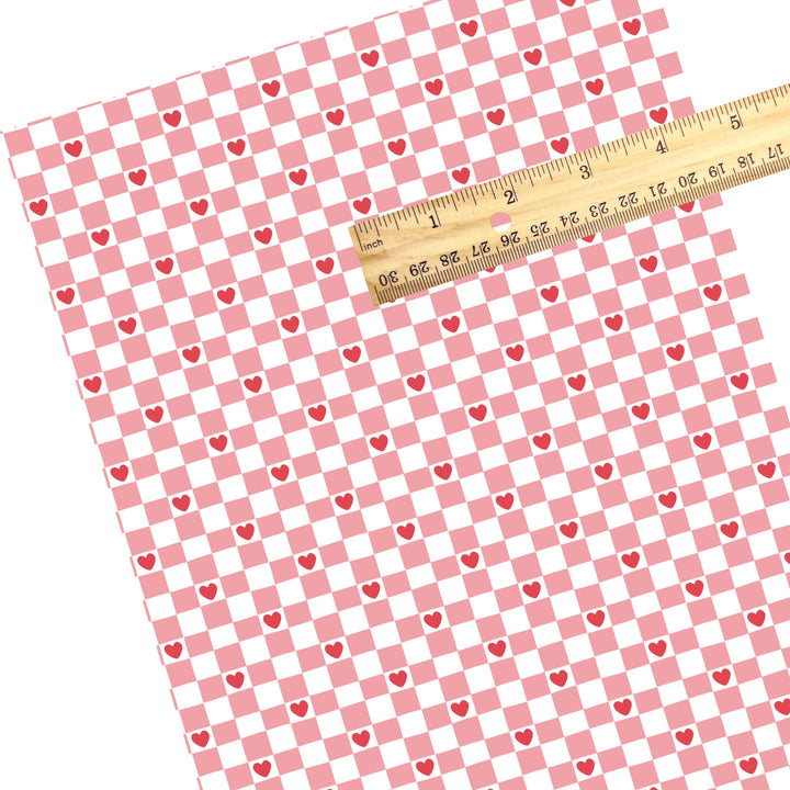 These holiday faux leather sheets contain the following design elements: pink and white checker pattern with red hearts. Our CPSIA compliant faux leather sheets or rolls can be used for all types of crafting projects.