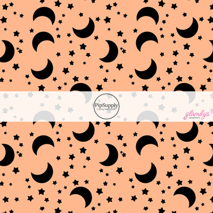 Scattered tiny stars with moons on orange hair bow strips