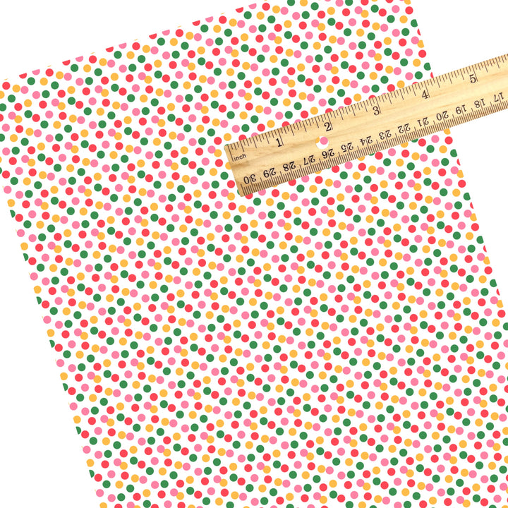 These summer faux leather sheets contain the following design elements: pink, yellow, and green dots on white. Our CPSIA compliant faux leather sheets or rolls can be used for all types of crafting projects.