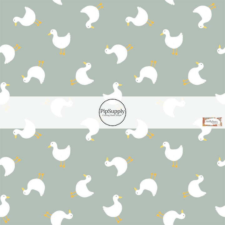 These spring fabric by the yard features geese on green. This fun pattern fabric can be used for all your sewing and crafting needs!