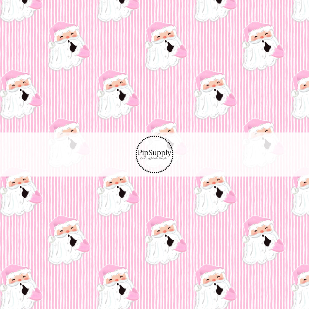 These Santa themed pattern fabric by the yard features the following design elements: Santa surrounded by pink and white Christmas stripes. This fun themed fabric can be used for all your sewing and crafting needs!