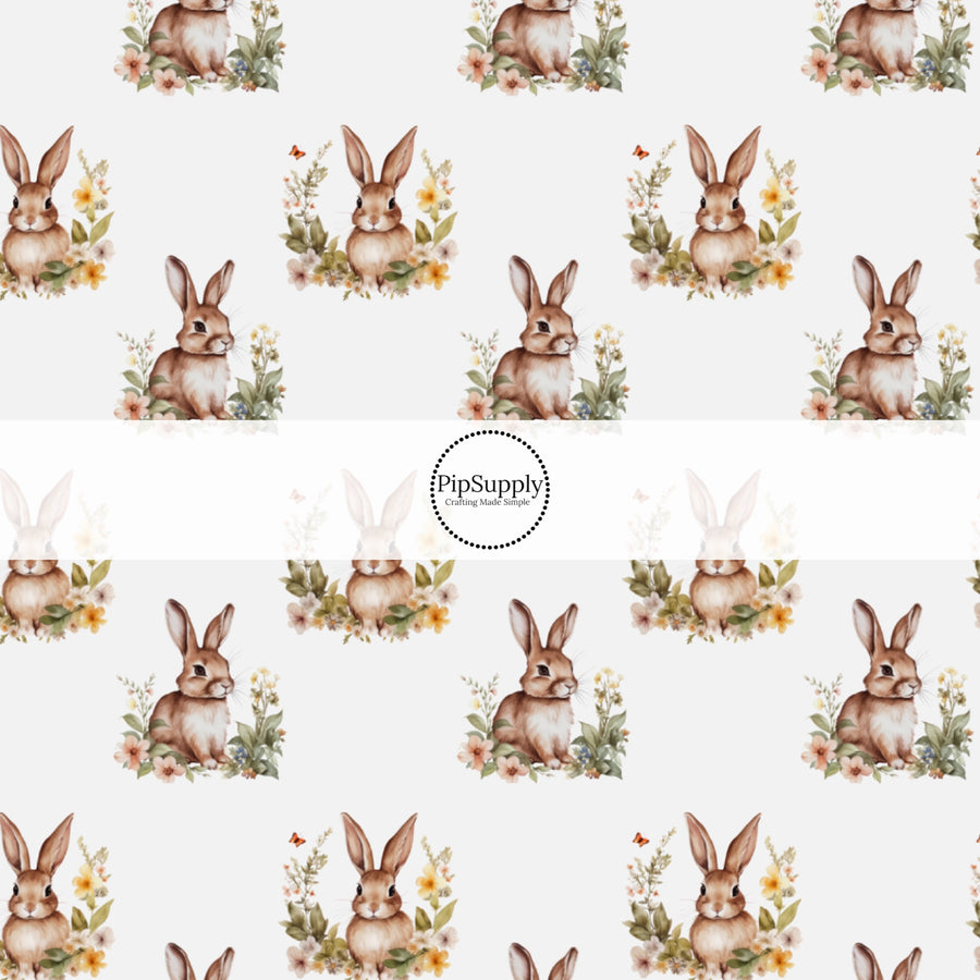 This Easter themed fabric by the yard features Easter bunnies surrounded by flowers. This fun pattern fabric can be used for all your sewing and crafting needs!