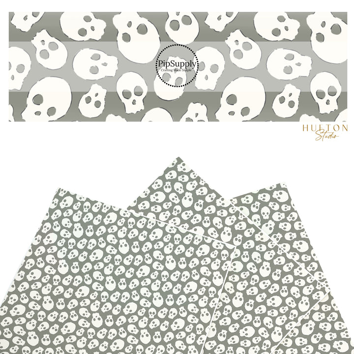 These Halloween themed pattern faux leather sheets contain the following design elements: cream skulls on grey. Our CPSIA compliant faux leather sheets or rolls can be used for all types of crafting projects.