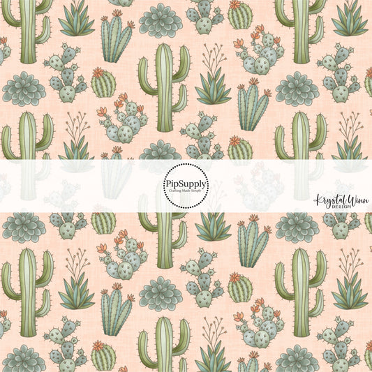 These small pink desert flowers and cacti on light blush fabric by the yard features green flowers and cacti plant.