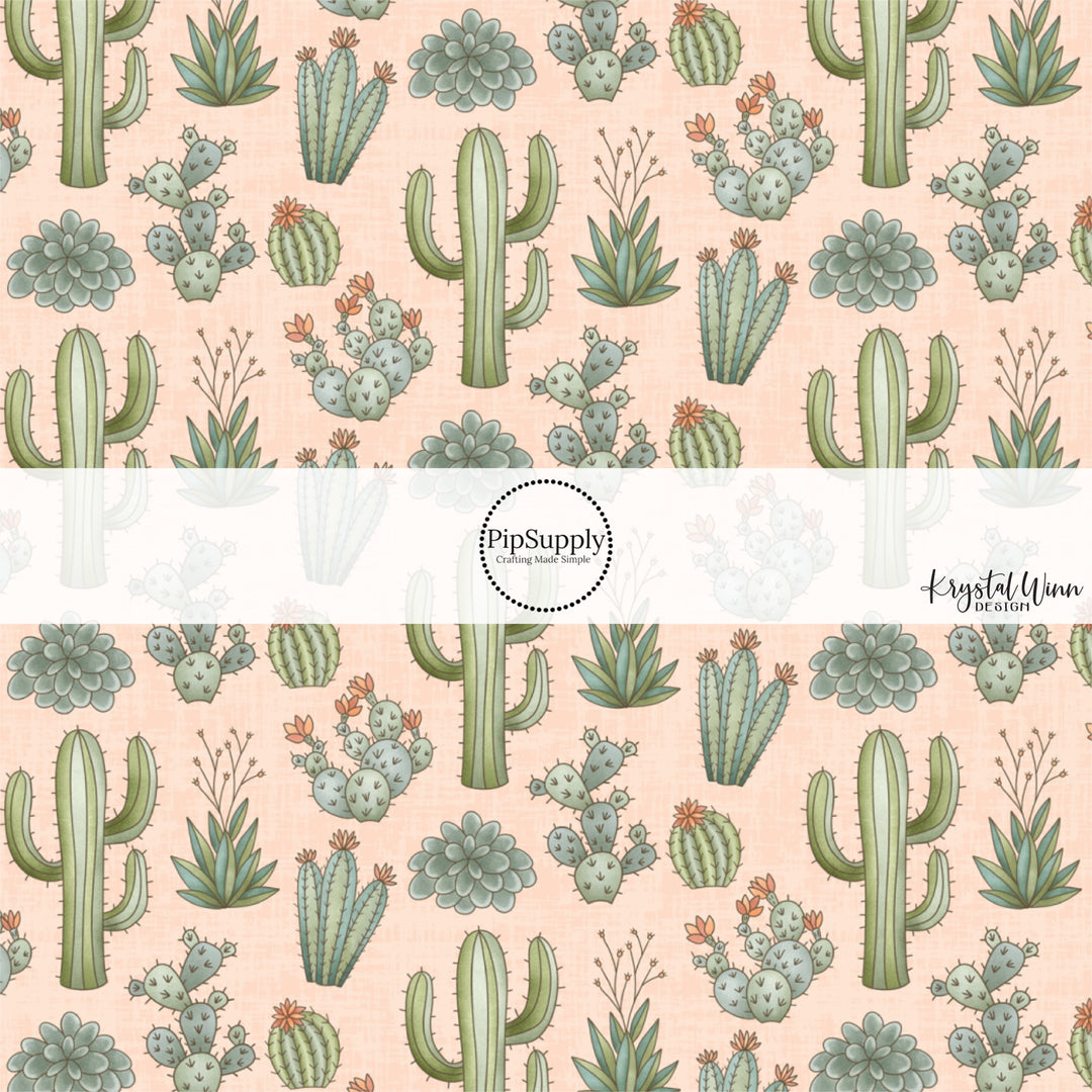 These small pink desert flowers and cacti on light blush fabric by the yard features green flowers and cacti plant.