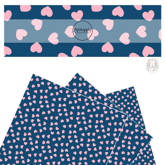 Light pink hearts on navy blue faux leather sheet. 