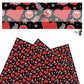 Red hearts and smiley faces with lightning bolts on black faux leather sheets