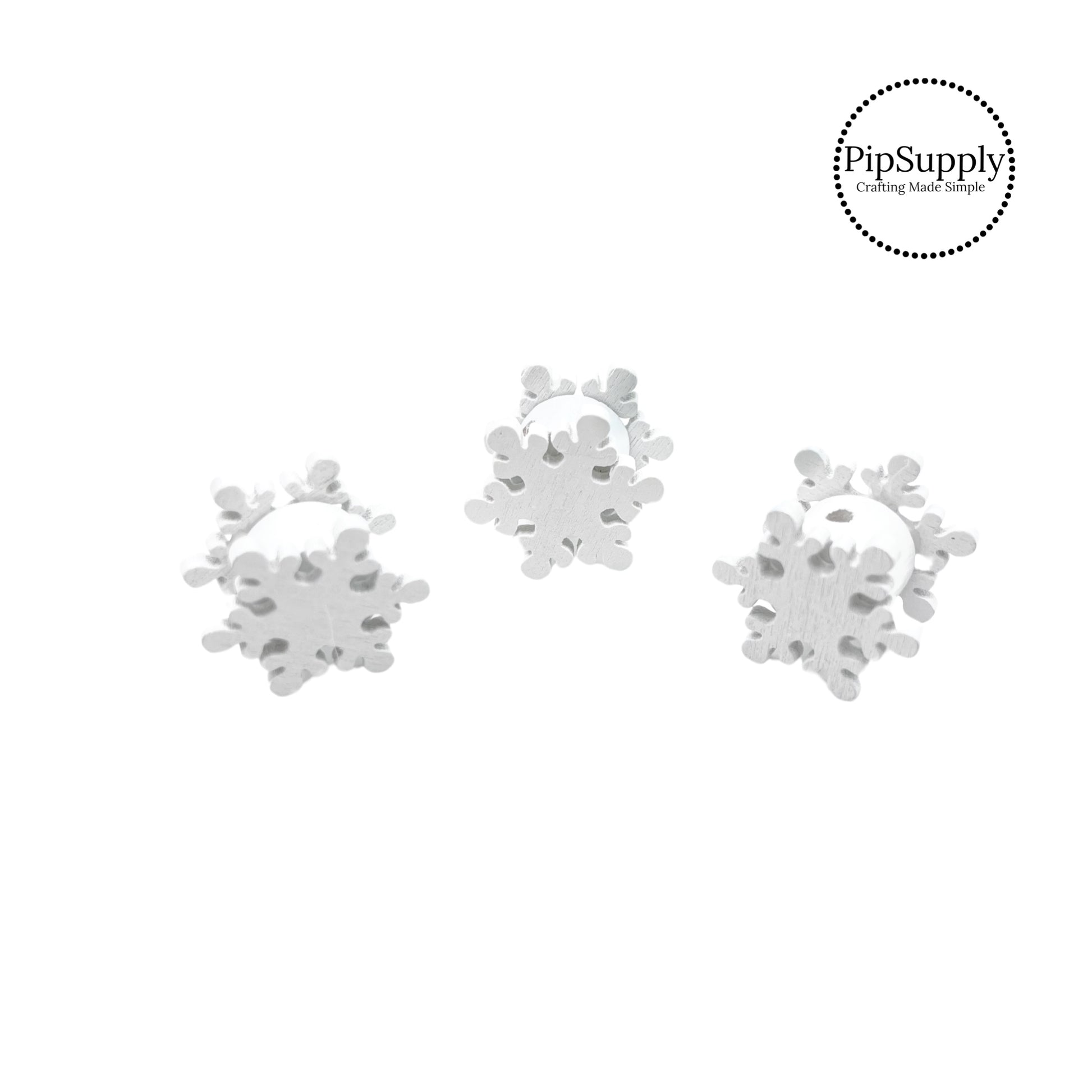 White snowflakes cutout wooden bead embellishment
