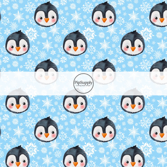 These winter themed pattern fabric by the yard features the following design elements: penguins surrounded by white snowflakes on blue. This fun themed fabric can be used for all your sewing and crafting needs!