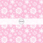 These Santa themed pattern fabric by the yard features the following design elements: white snowflakes on pink. This fun themed fabric can be used for all your sewing and crafting needs!