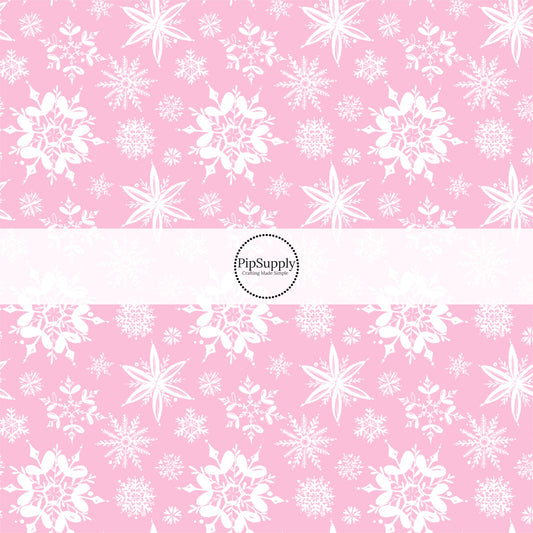 These Santa themed pattern fabric by the yard features the following design elements: white snowflakes on pink. This fun themed fabric can be used for all your sewing and crafting needs!