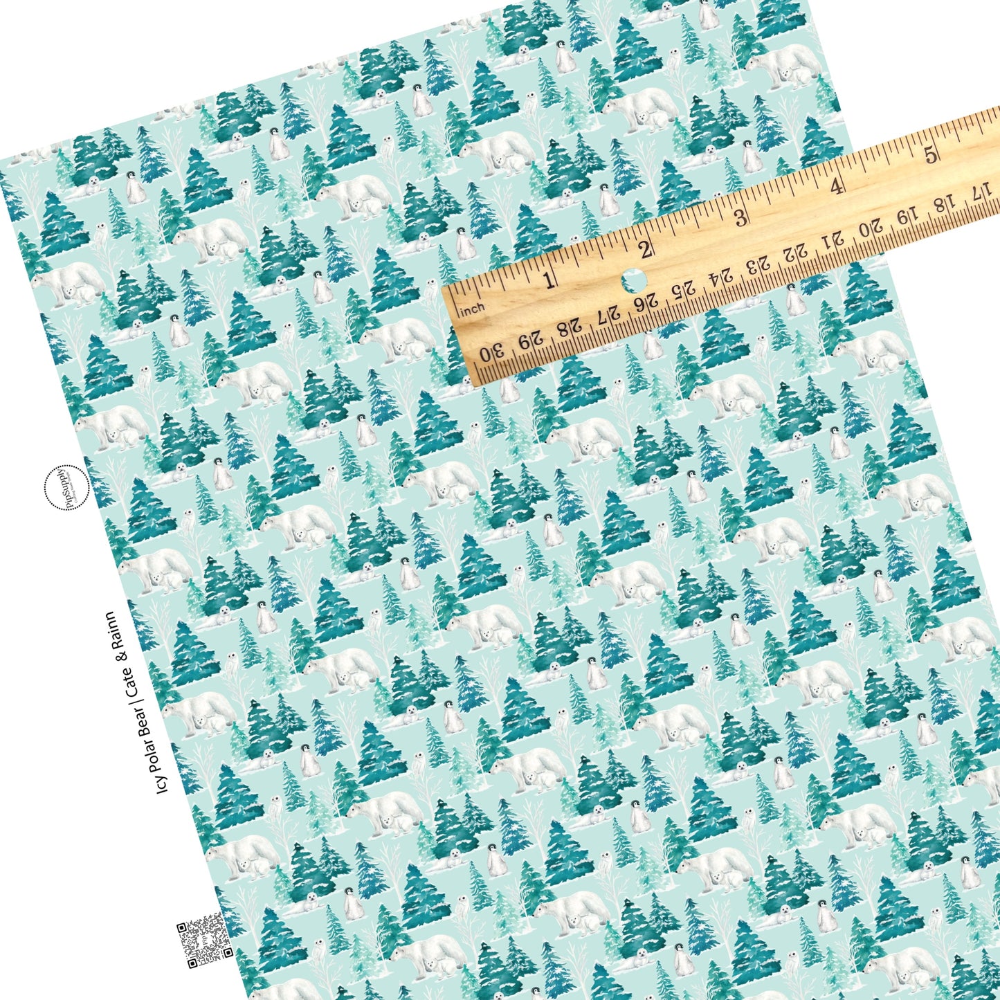 Polar bears, penguins, owls, and snowy trees on light blue faux leather sheets