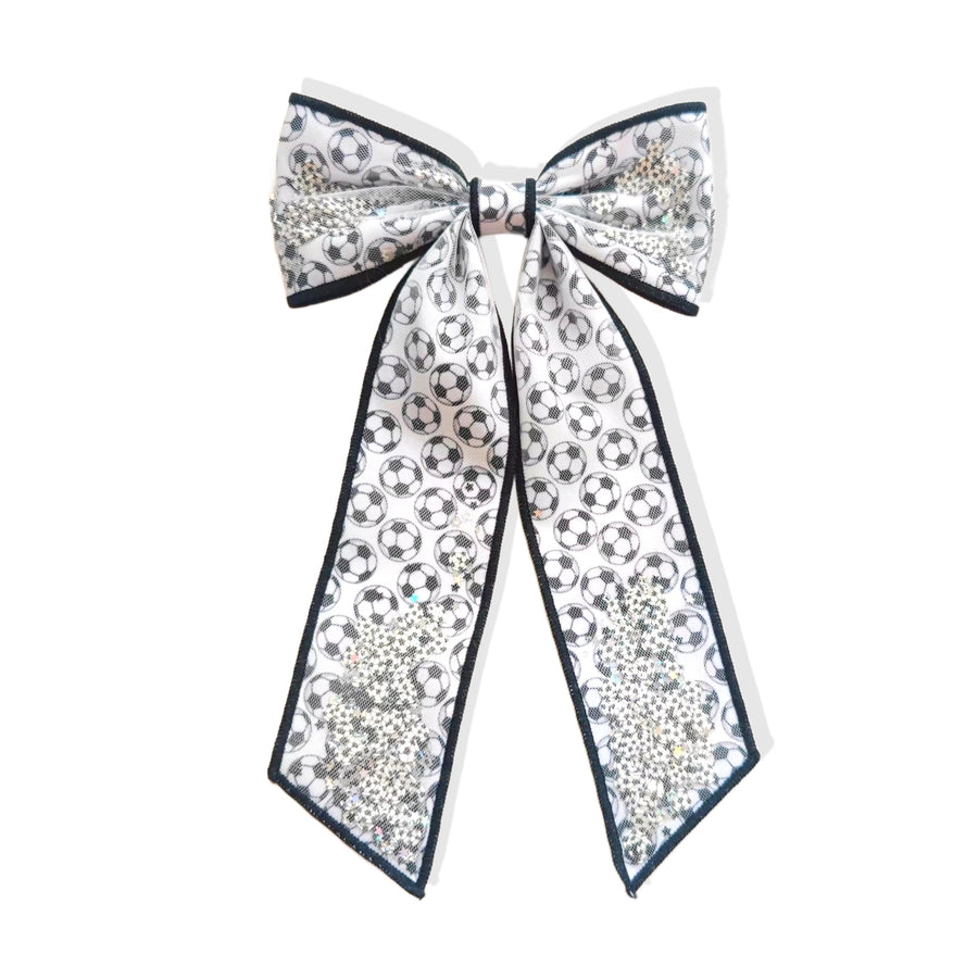 These sports pattern long tail shaker tied bows are ready to package and resell to your customers no sewing or measuring necessary! These hair bows come with a clip already attached. The shaker bow comes pre-filled with soccer pattern clay mix.