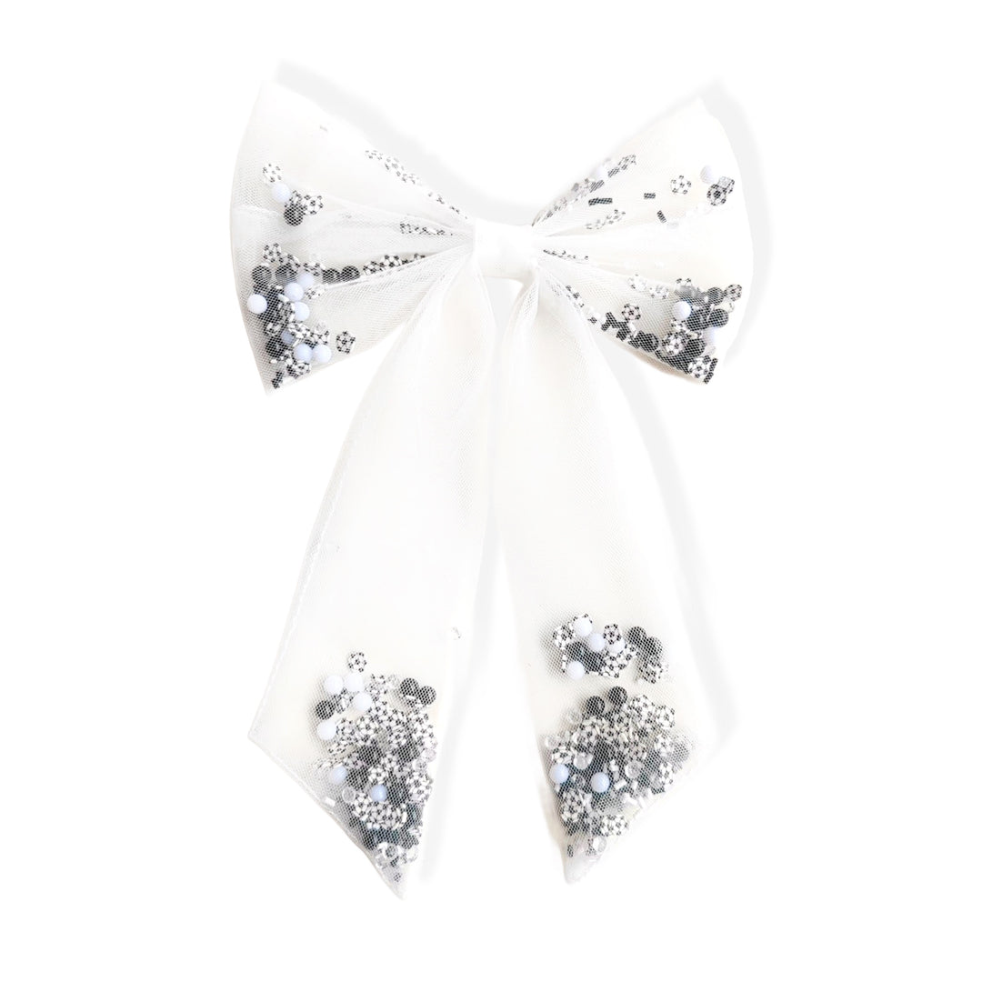 These sports tulle long tail shaker tied bows are ready to package and resell to your customers no sewing or measuring necessary! These hair bows come with a clip already attached. The tulle shaker bow comes pre-filled with soccer pattern clay mix.