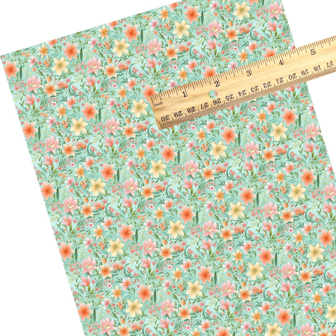 These floral themed faux leather sheets contain the following design elements: pink and yellow flowers on teal. Our CPSIA compliant faux leather sheets or rolls can be used for all types of crafting projects.