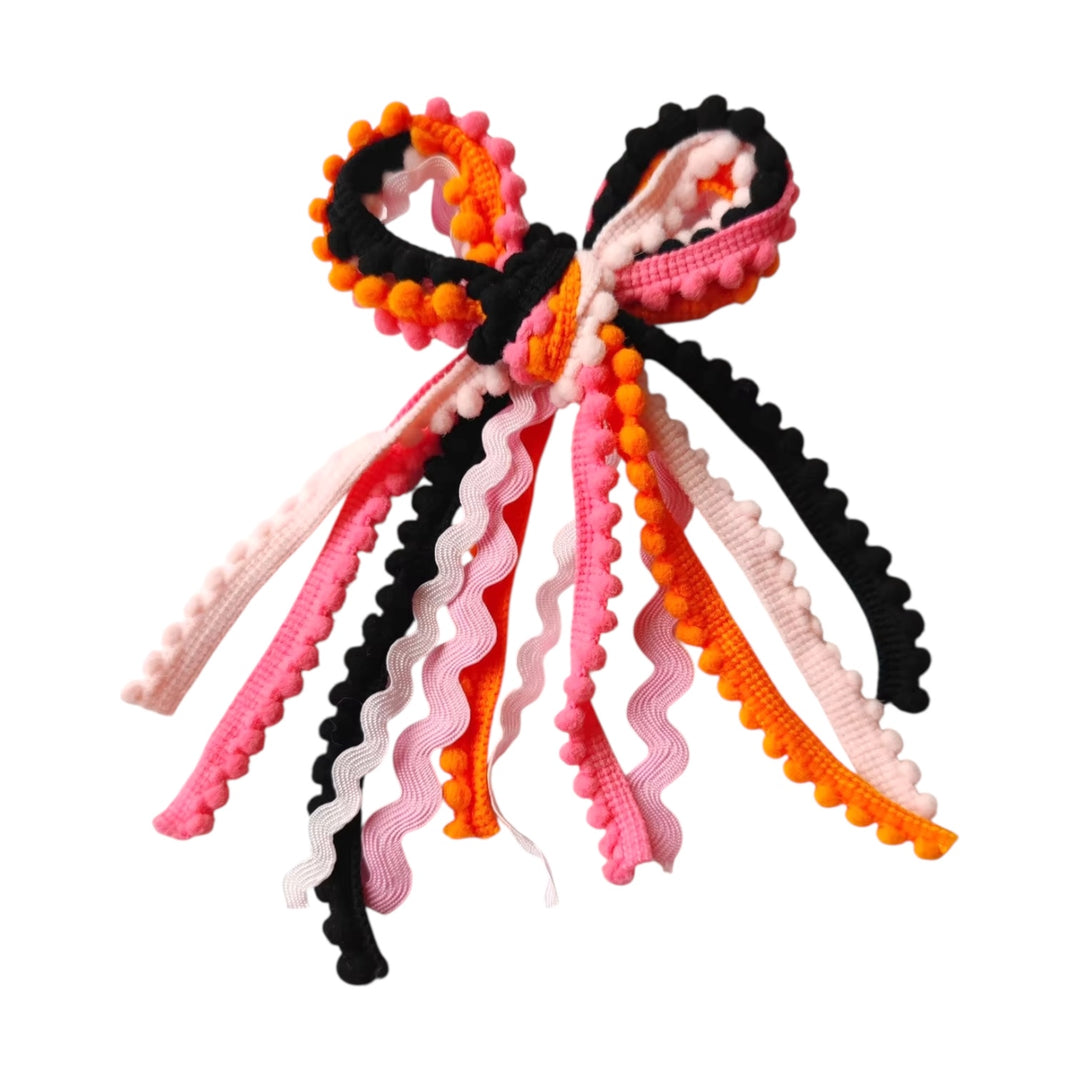 These Halloween colored messy ribbon tied bows are ready to package and resell to your customers no sewing or measuring necessary! These hair bows come with a clip already attached.