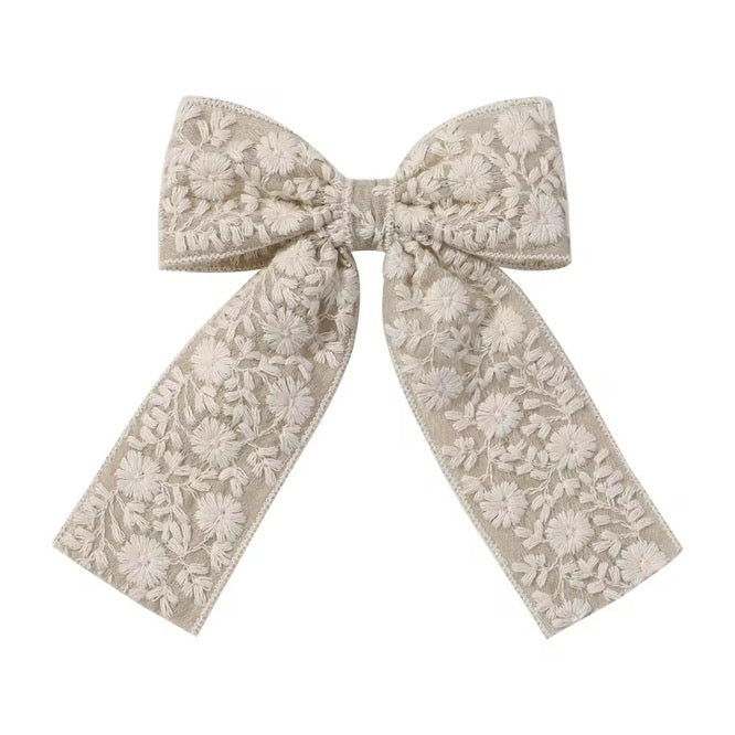 These floral lace pre-cut tied bows are ready to package and resell to your customers no sewing or measuring necessary! These hair bows come with a clip already attached.