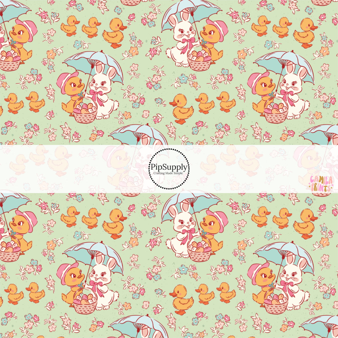 This Easter themed fabric by the yard features Easter bunnies and ducks on mint. This fun pattern fabric can be used for all your sewing and crafting needs!