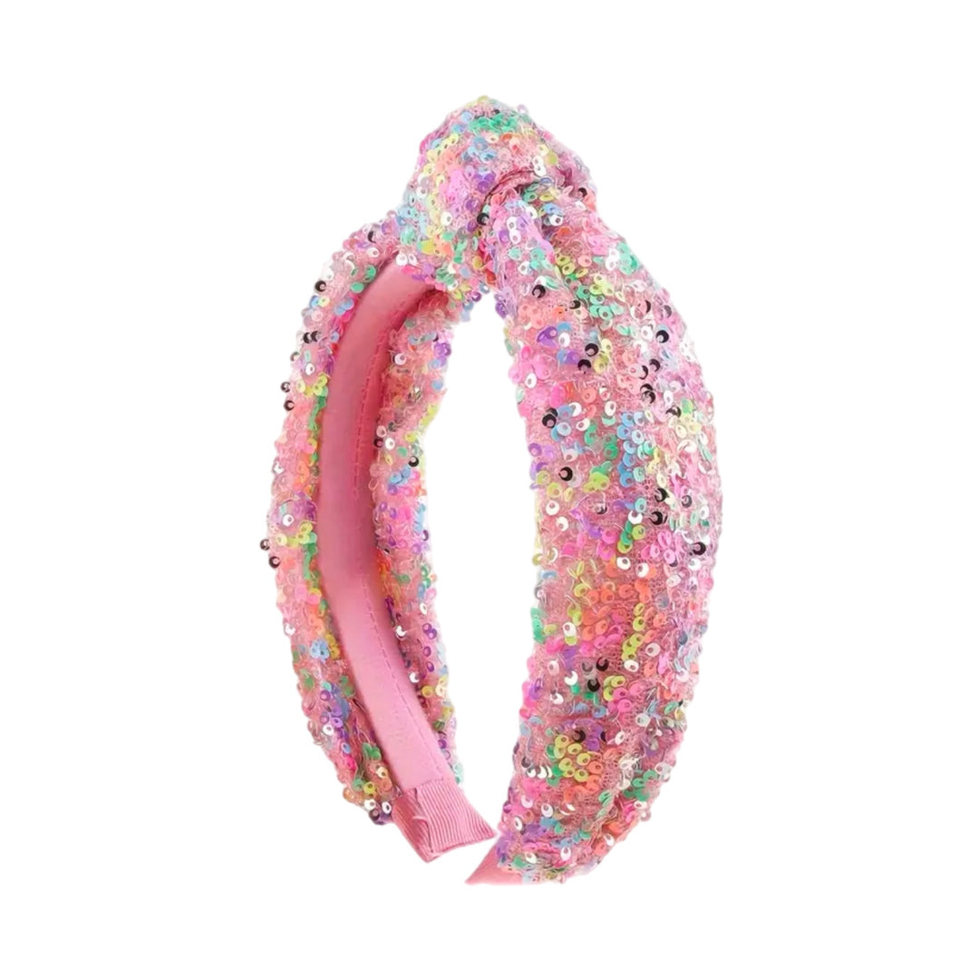 These colorful sequin light pink knotted headbands are a stylish hair accessory having the look of a knotted headwrap and the on and off ease of a headband. Made with high quality fabric these headbands are a perfect simple and fashionable answer to keeping your hair back!