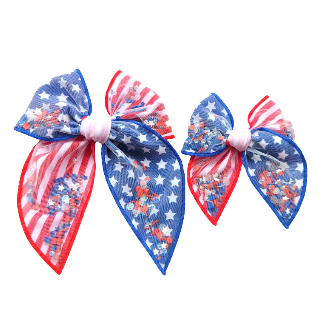 These patriotic stars and stripes shaker pre-cut tied bows are ready to package and resell to your customers no sewing or measuring necessary! These hair bows come with a clip already attached. The shaker bows come pre-filled with patriotic stars and sprinkles clay mix.