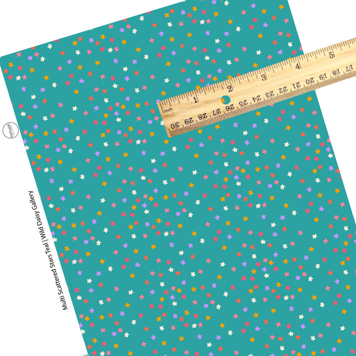 Scattered bright colored stars on teal faux leather sheets