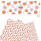Pink and orange pumpkins with stars on white faux leather sheets