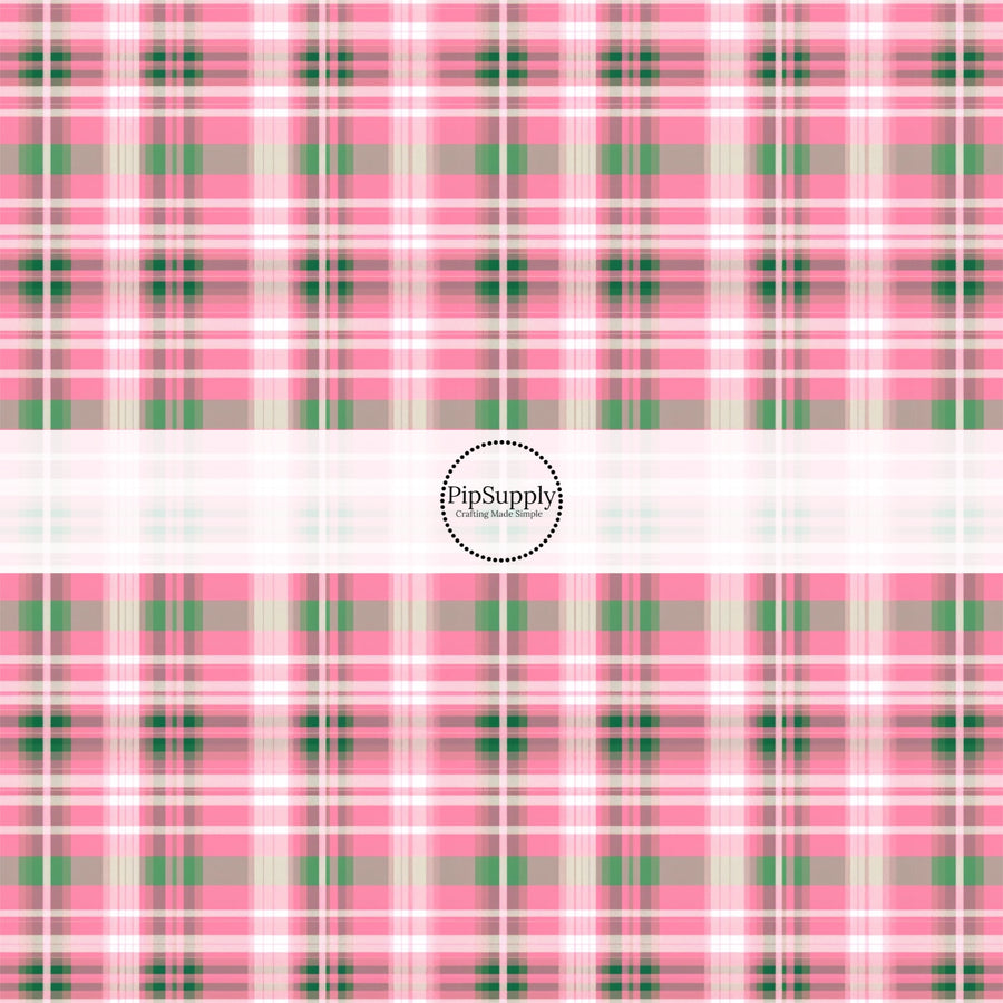 This spring fabric by the yard features pink and green gingham pattern. This fun pattern fabric can be used for all your sewing and crafting needs!