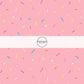 This ice cream sprinkles fabric by the yard features strawberry sprinkles on pink ice cream. This fun themed fabric can be used for all your sewing and crafting needs!