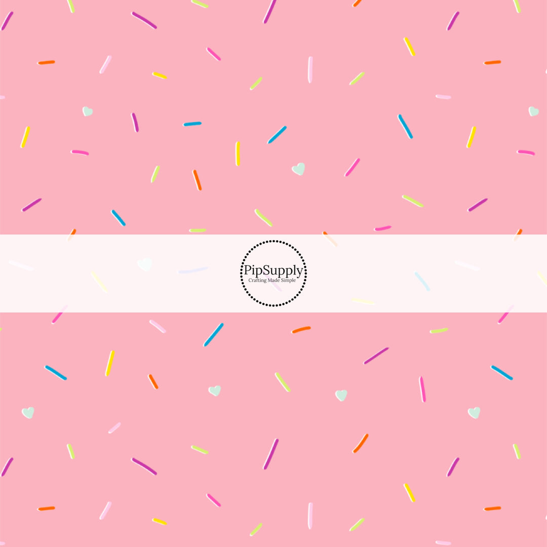 This ice cream sprinkles fabric by the yard features strawberry sprinkles on pink ice cream. This fun themed fabric can be used for all your sewing and crafting needs!