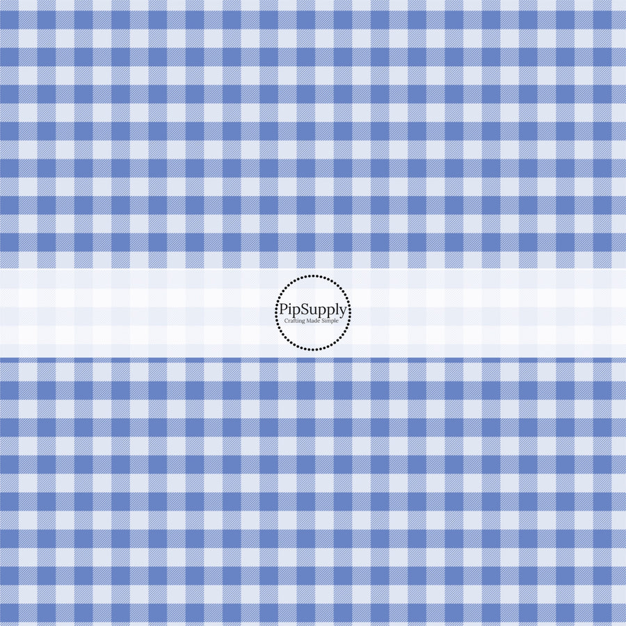 This spring fabric by the yard features blue gingham pattern. This fun pattern fabric can be used for all your sewing and crafting needs!