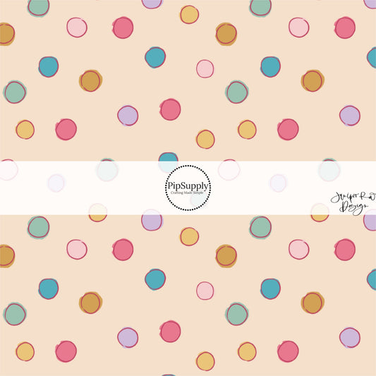 This summer fabric by the yard features colorful summer haze dots on cream. This fun summer themed fabric can be used for all your sewing and crafting needs!