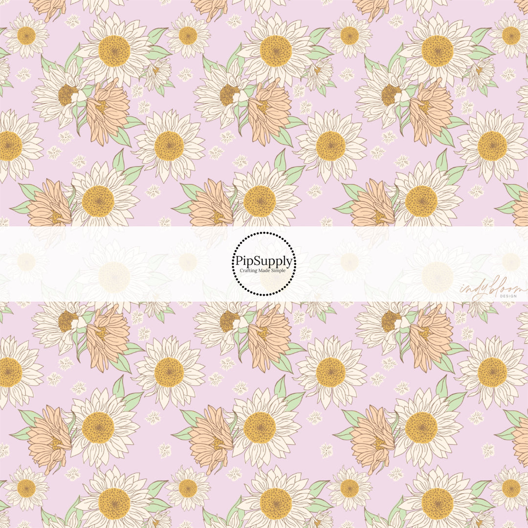 These spring fabric by the yard features lilac sunflowers on lilac. This fun pattern fabric can be used for all your sewing and crafting needs!