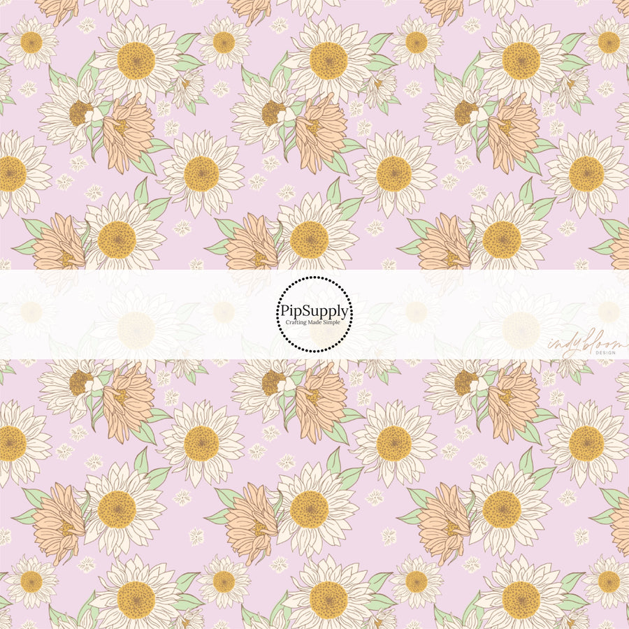 These spring fabric by the yard features lilac sunflowers on lilac. This fun pattern fabric can be used for all your sewing and crafting needs!