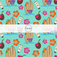 This tropical fabric by the yard features surf boards, coconuts, and tropical flowers on aqua. This fun summer themed fabric can be used for all your sewing and crafting needs!