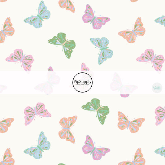 Pink, Blue, and Orange Butterflies on Cream Fabric by the Yard