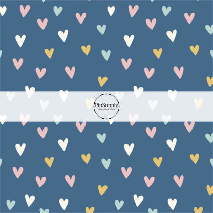 These spring pattern themed no sew bow strips can be easily tied and attached to a clip for a finished hair bow. These patterned bow strips are great for personal use or to sell. These bow strips features light pink, light blue, yellow, and cream hearts on dark blue. 