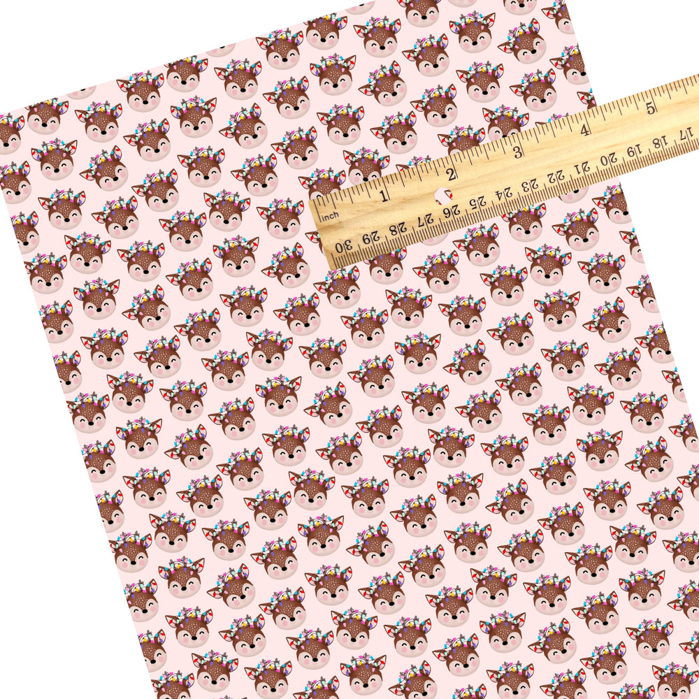 These winter themed pattern faux leather sheets contain the following design elements: reindeer on pink. Our CPSIA compliant faux leather sheets or rolls can be used for all types of crafting projects.