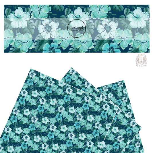 Light blue and aqua tropical flowers and palms on dark navy faux leather sheets. 