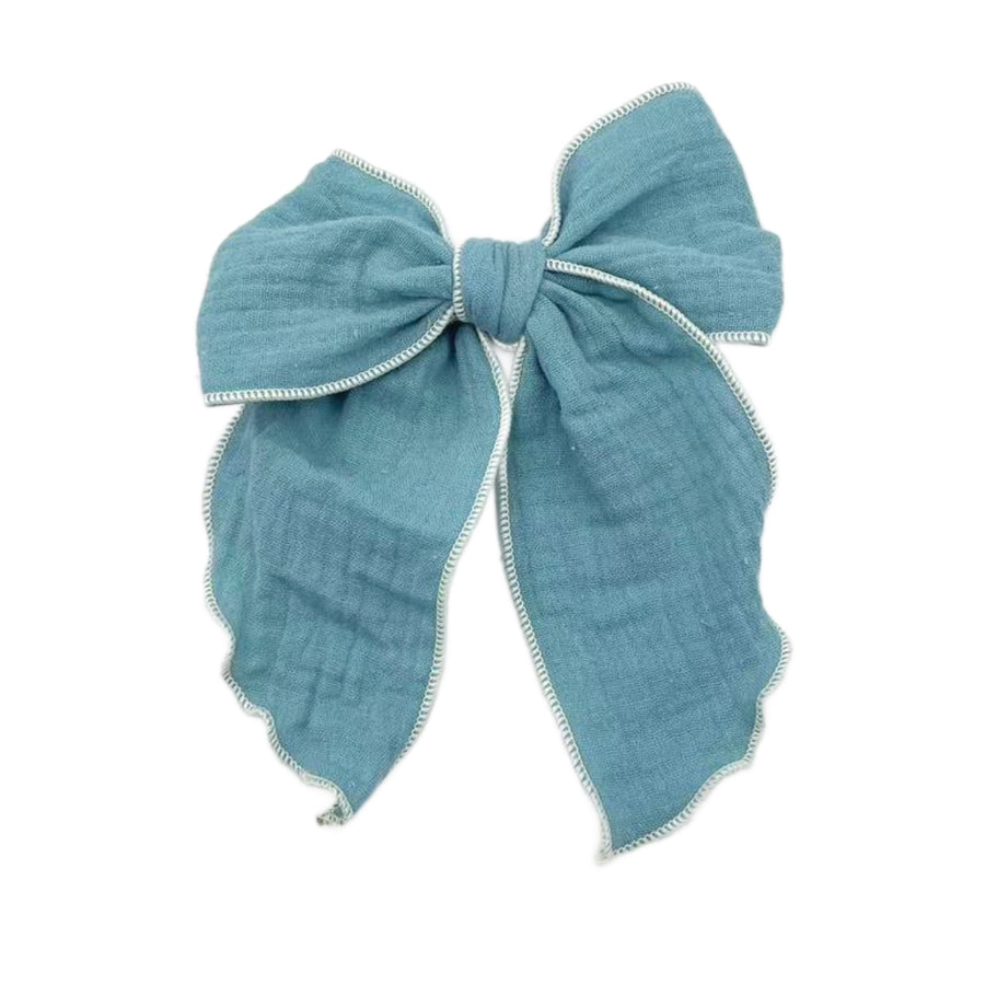 These solid pre-cut tied bows are ready to package and resell to your customers no sewing or measuring necessary! These hair bows come with a clip already attached.
