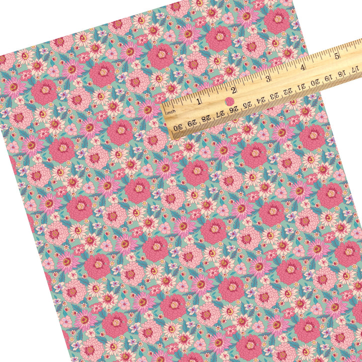 These summer faux leather sheets contain the following design elements: pink flowers on teal. Our CPSIA compliant faux leather sheets or rolls can be used for all types of crafting projects.