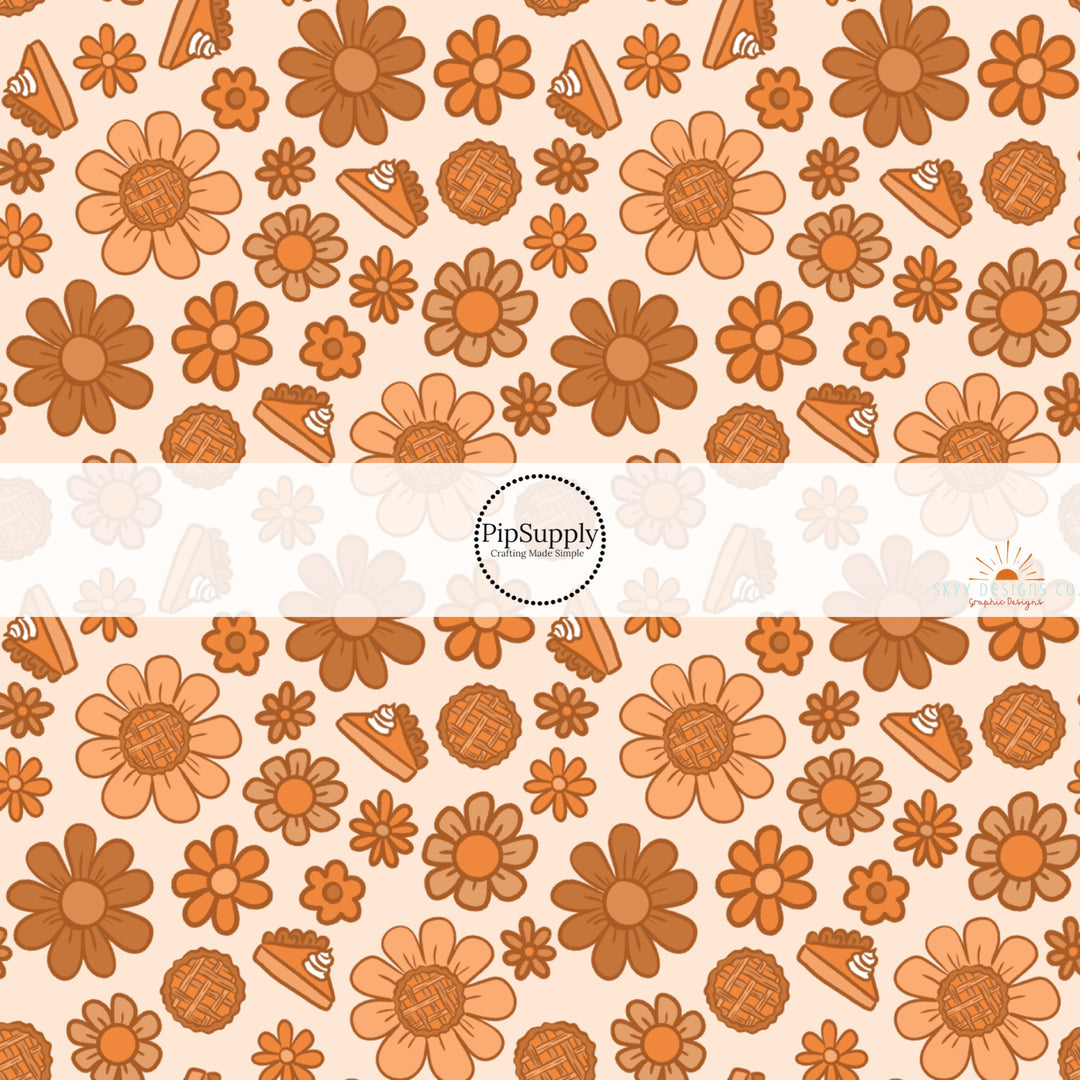 These fall themed pattern fabric by the yard features the following design elements: flowers and pumpkin pie. This fun themed fabric can be used for all your sewing and crafting needs!