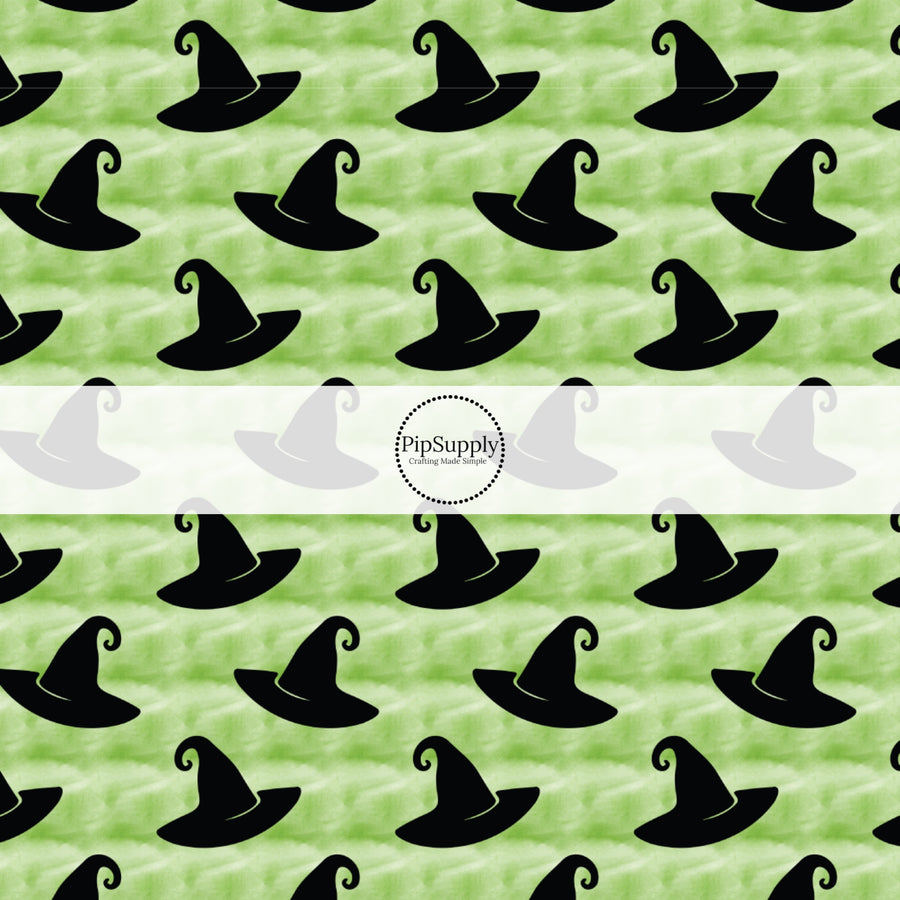 This fun themed fabric by the yard features black witch hats on green. This fun pattern fabric can be used for all your sewing and crafting needs!