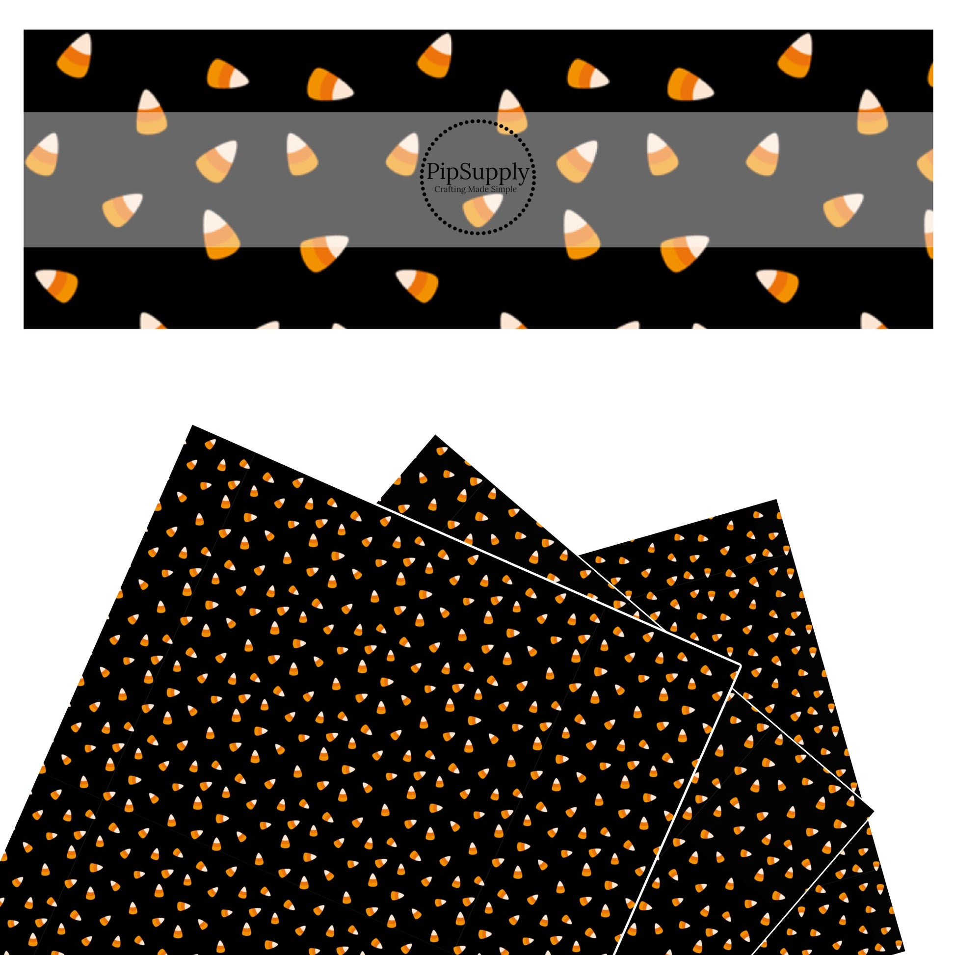 Orange candy corns scattered on black faux leather sheets