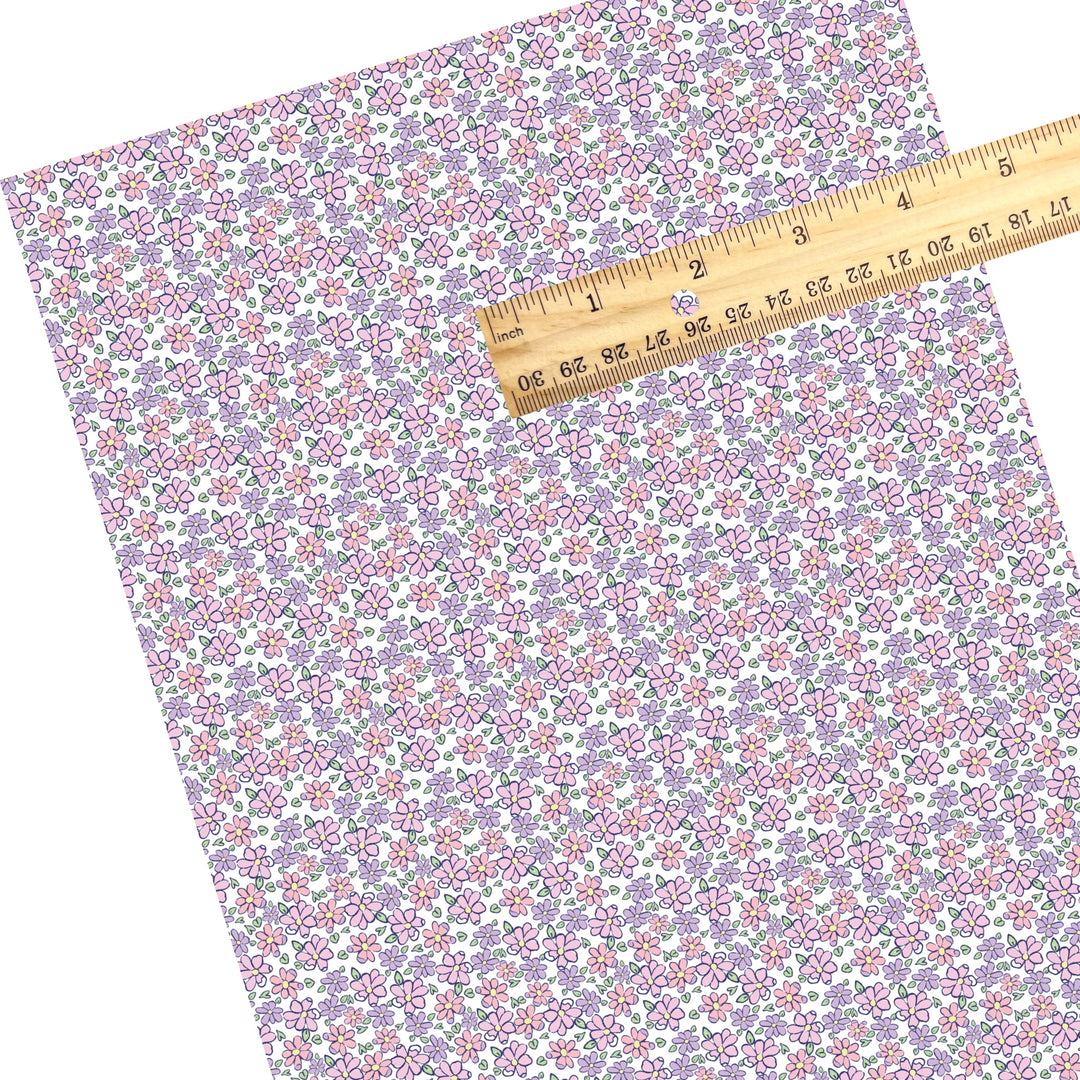 These spring floral faux leather sheets contain the following design elements: tiny pink and purple flowers. Our CPSIA compliant faux leather sheets or rolls can be used for all types of crafting projects.