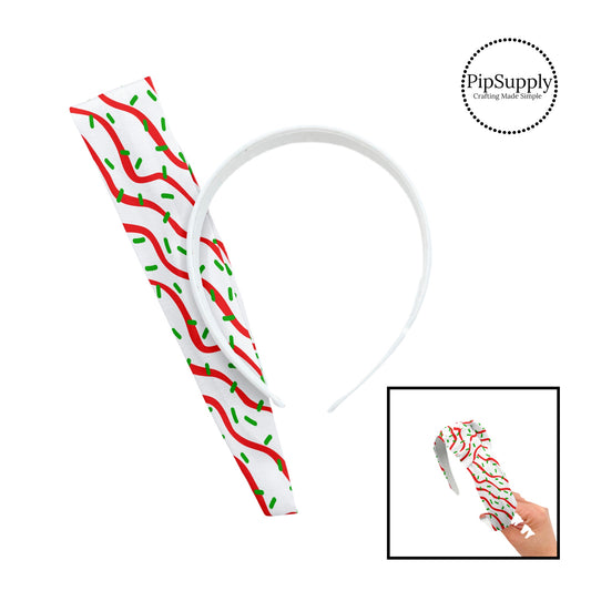 Green sprinkles with red icing on white tree cake knotted headband kit