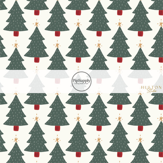 These Christmas themed pattern fabric by the yard features the following design elements: Christmas trees on cream. This fun themed fabric can be used for all your sewing and crafting needs!