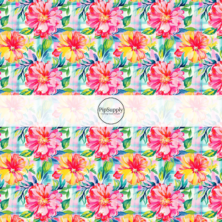 These tropical floral fabric by the yard features bright tropical flowers on plaid pattern. This fun pattern fabric can be used for all your sewing and crafting needs!