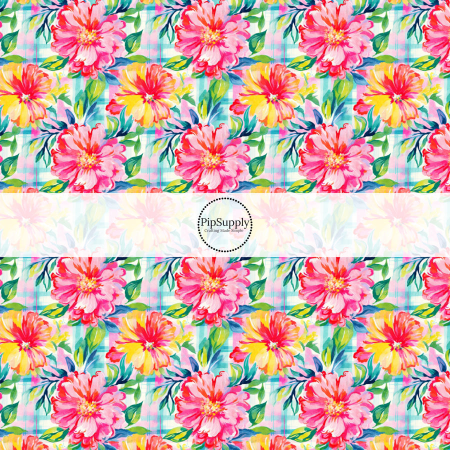 These tropical floral fabric by the yard features bright tropical flowers on plaid pattern. This fun pattern fabric can be used for all your sewing and crafting needs!