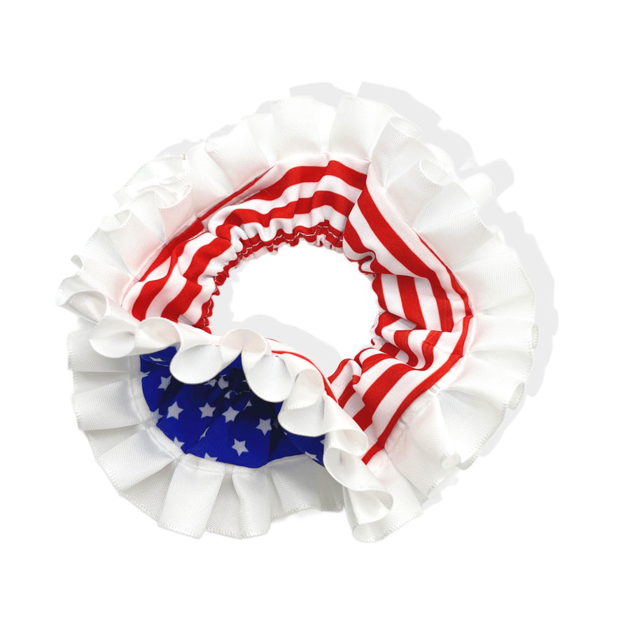 These patriotic layered scrunchies are a stylish hair accessory. The scrunchie features stars and strips pattern with white ruffle layers. These scrunchies are so soft making a comfortable fit. These scrunchies are ready to wear or to sell to others.